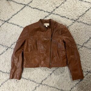 Michael Kors tan leather jacket.